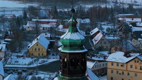seasonal winter village scenery, worship landmark, aerial orbit view