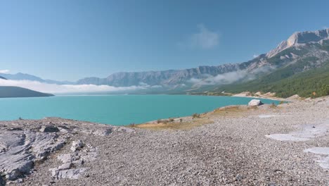 abraham lake in autumn with blue sky