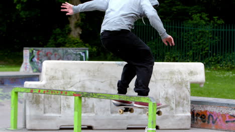 Young-skateboarder-skating-the-outdoor-skatepark