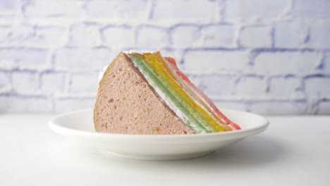 rainbow layered cake slice