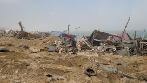 ruins of scattered houses destroyed by war in the gaza strip