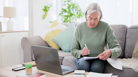 laptop, writing and calculator for finance