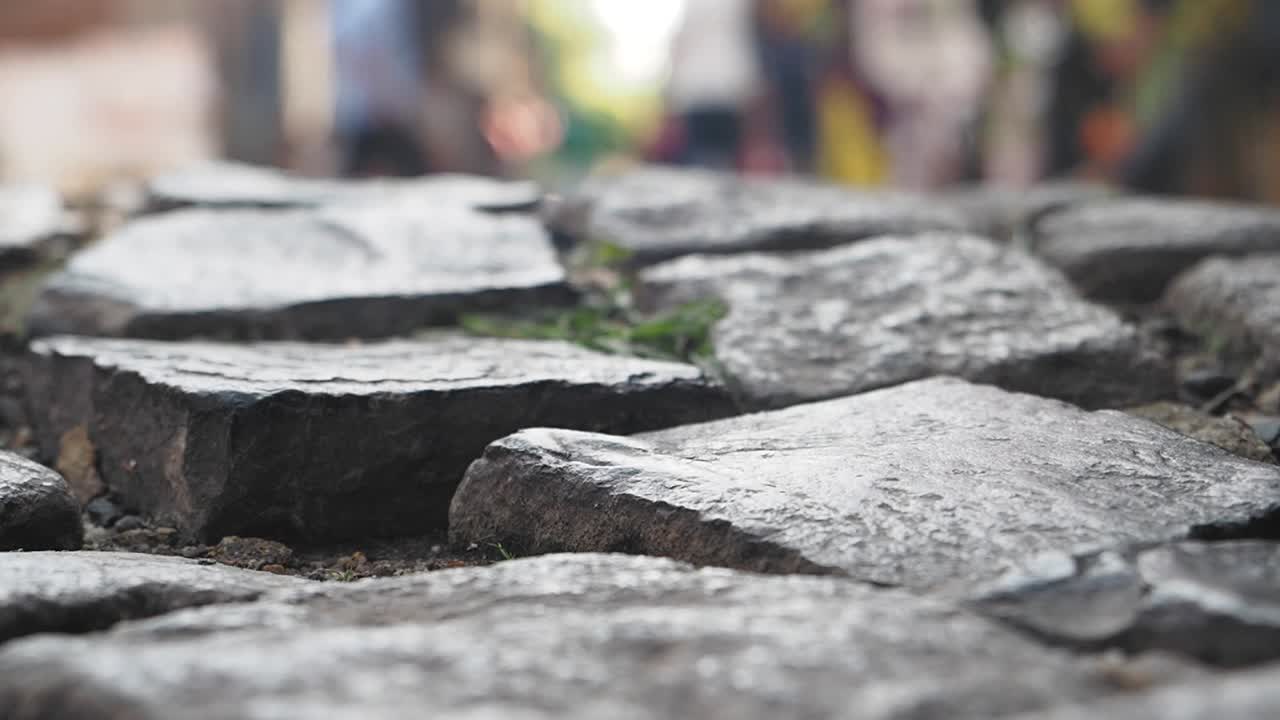 Cobblestone Street with People in Background