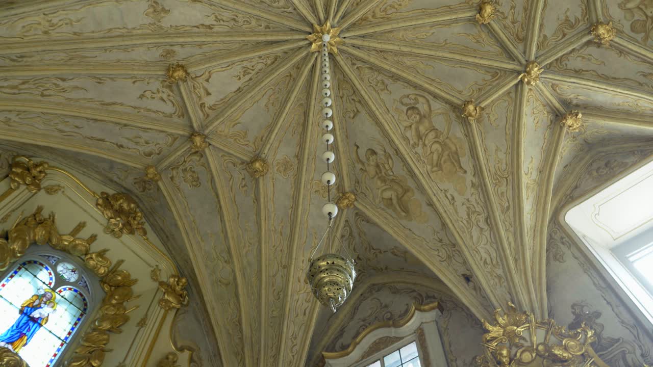 Richly decorated ceiling vault in a historic medieval chape