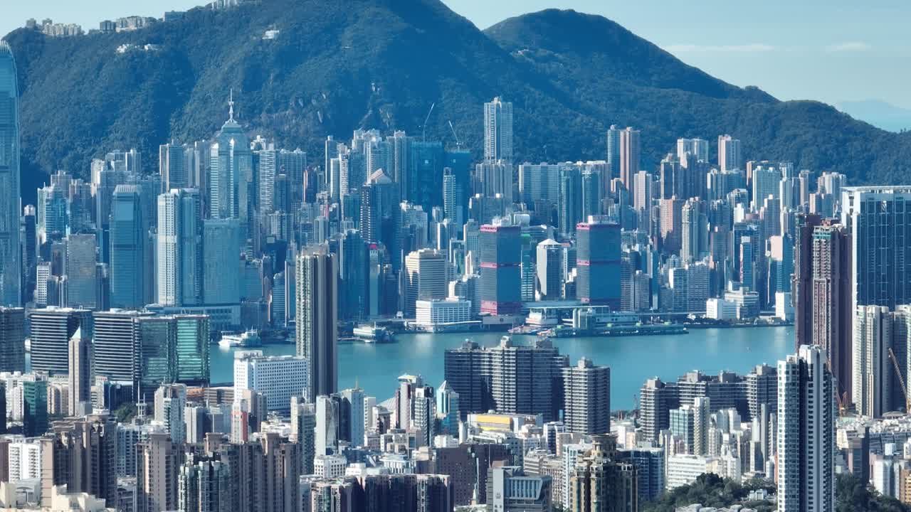 홍콩 센트럴 디스트릭트의 4k 텔레  뷰 - 하늘에서 느린 팬 항공 뷰 글.