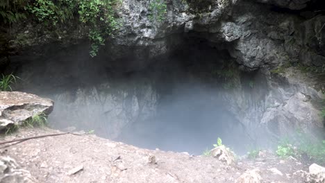 cave entrance with mist