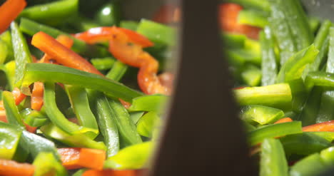 Mixing-Veggies-On-Pan