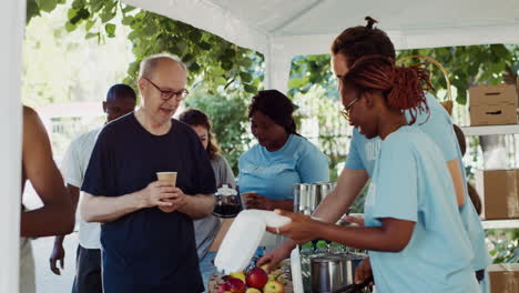 humanitarians give food to the homeless