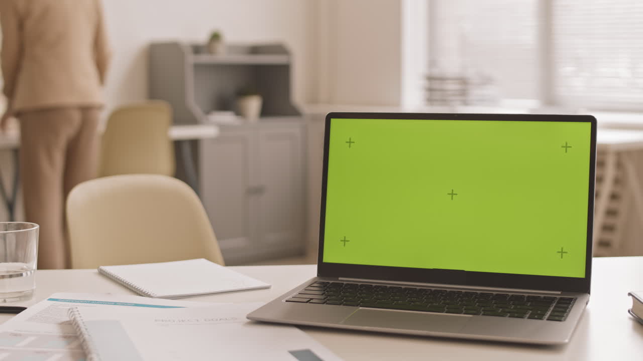 Chromakey on Laptop in Busy Office