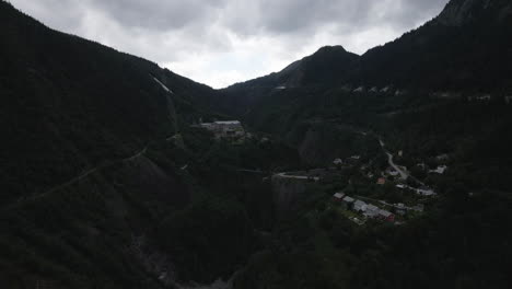 Aerial-shot-of-houses-and-valley-view-from-above-during-the-morning-time