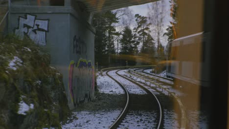 view from inside oslo train, frognerseteren line to vinterpark