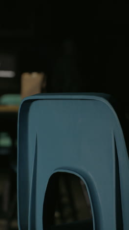 close-up of a blue chair in a classroom