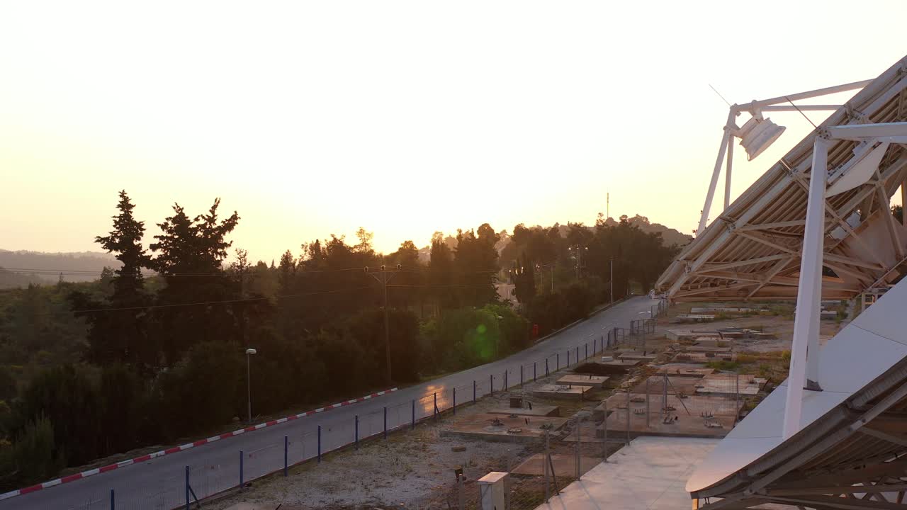 Satellite Dish at Sunrise/Sunset over Hills