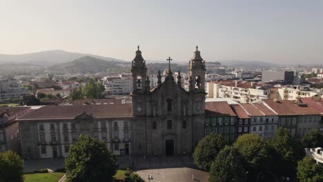 aerial rotation over old congregados minster building, braga old town - portugal