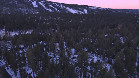 Drone-shot-of-residential-in-rural-area-in-winter-and-snow