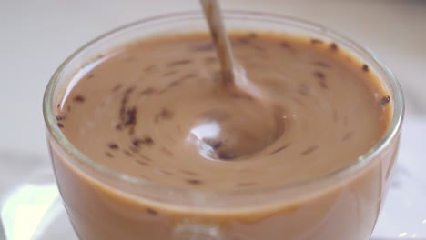 stirring coffee