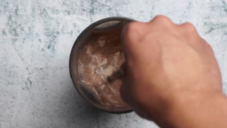 mixing a chocolate drink