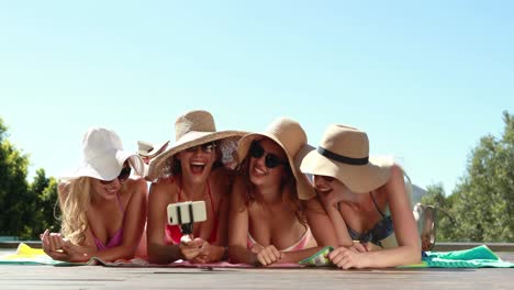 happy women with hats taking selfie