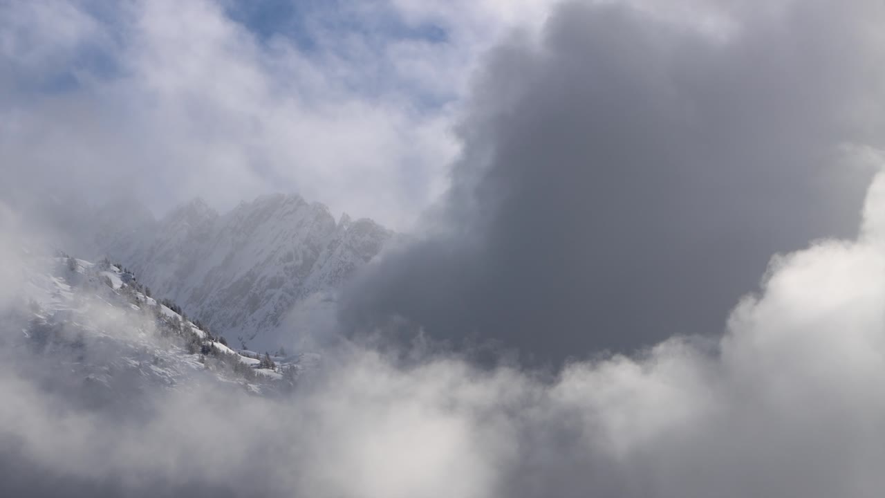This is a large ski area that prepares Cortina 2026 in Italy. The locations are captured with a drone that shows the beauty of winter sports that combine blue sky, white snow and heaven