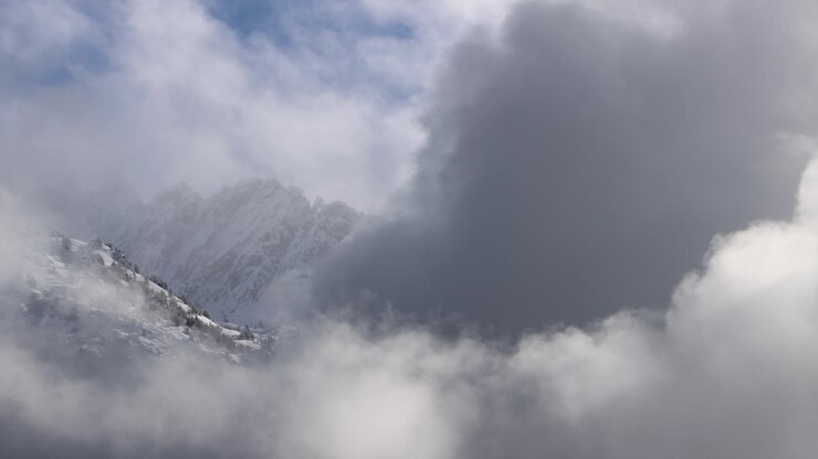 This is a large ski area that prepares Cortina 2026 in Italy. The locations are captured with a drone that shows the beauty of winter sports that combine blue sky, white snow and heaven