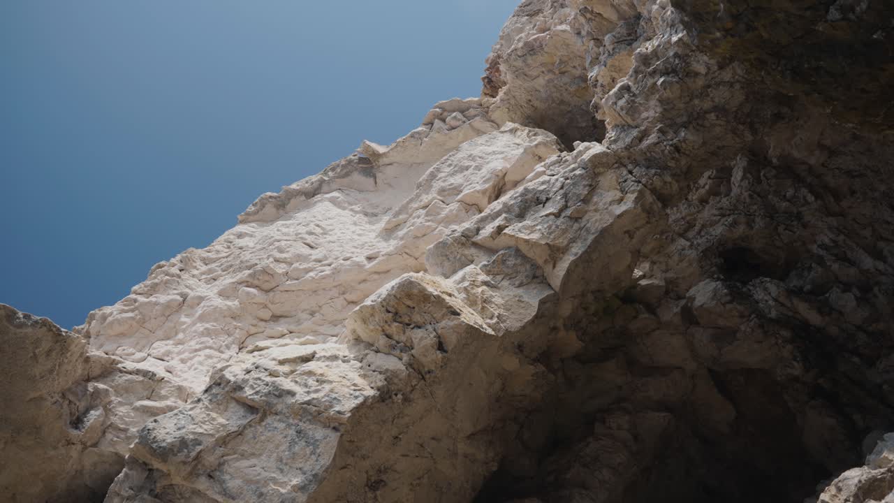 Craggy Shoreline With Limestone Cliffs During Sunrise. High Angle Shot