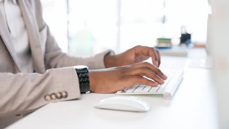 Black-man,-hands-and-typing-business-on-computer