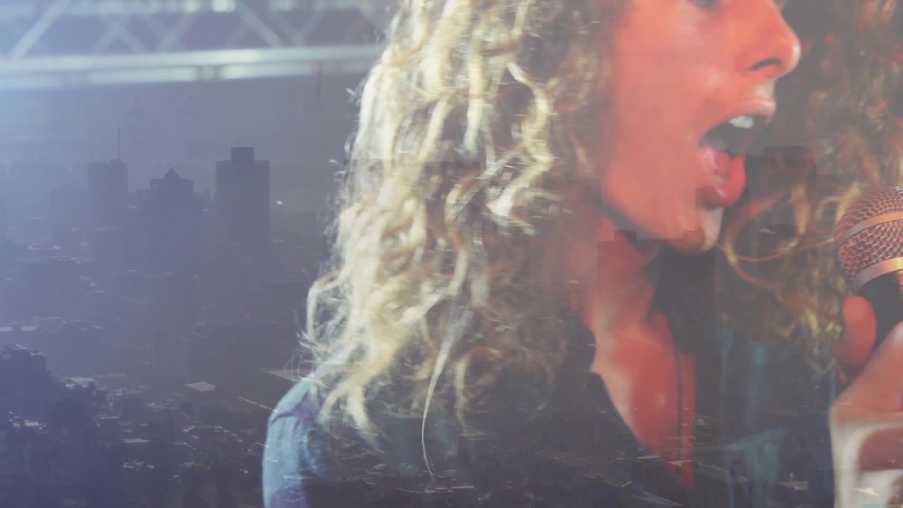Energetic Male Singer Performing Live with City Skyline Overlay
