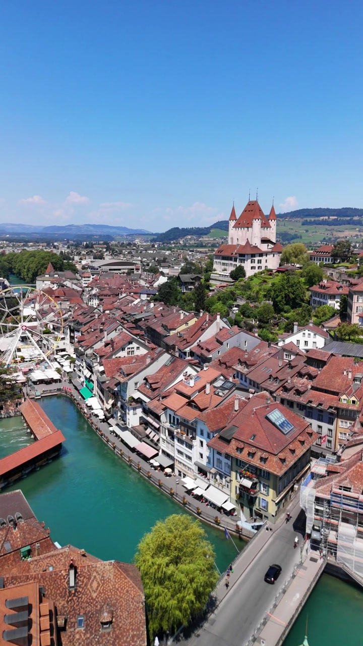 Thun medieval city in Switzerland Aare river, aerial drone above Europe travel destination