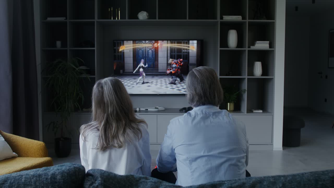 Couple Playing Video Game Together at Home