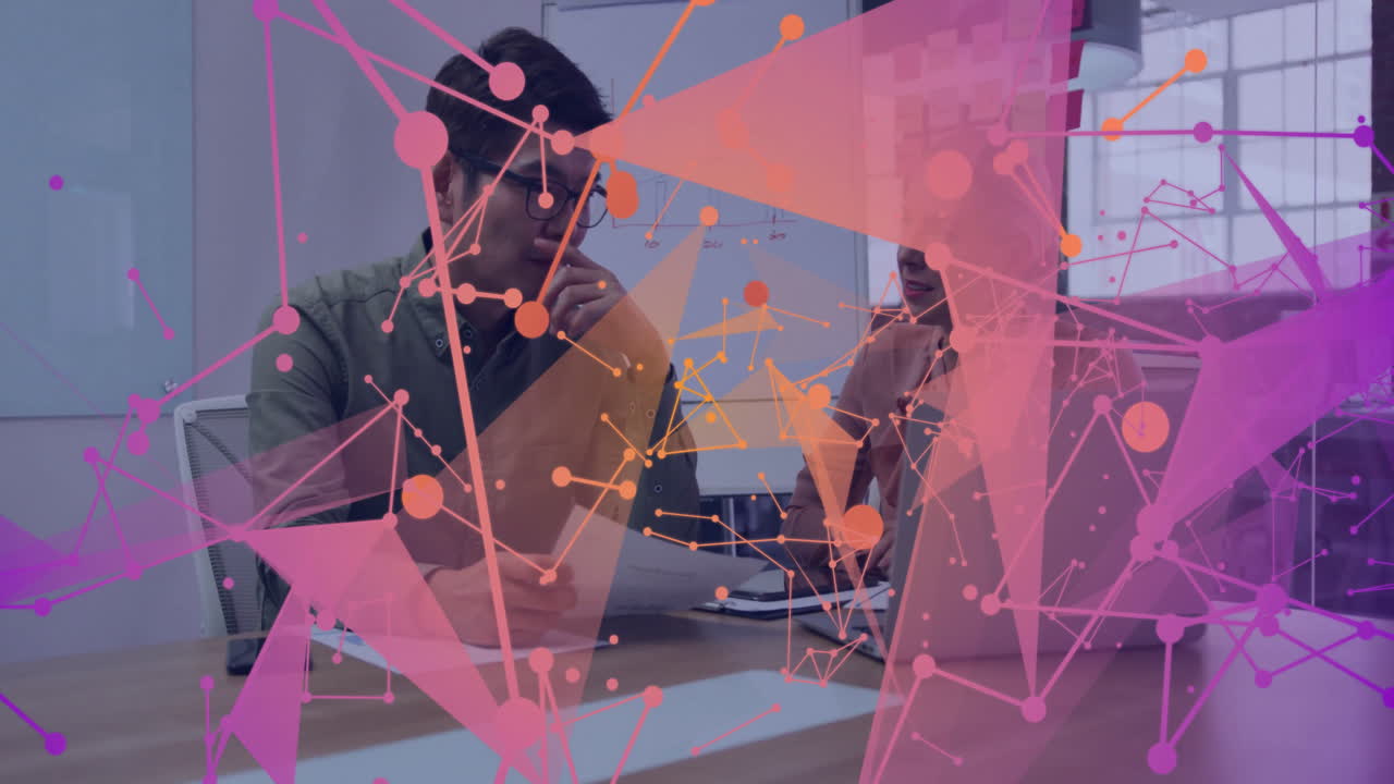 Discussing animation and data visualization, business professionals in school setting