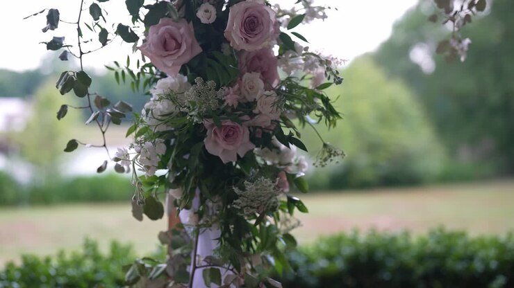 captivating and detailed shot of exquisite flowers, meticulously arranged for a wedding ceremony