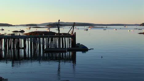 the silhouette of a lobster village in stonington maine