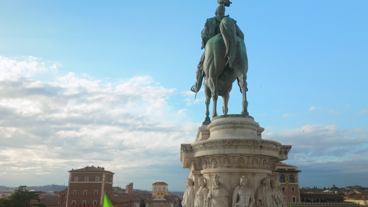 Close-up of mounted statue in Rome with clear blue sky background, iconic Roman heritage.
