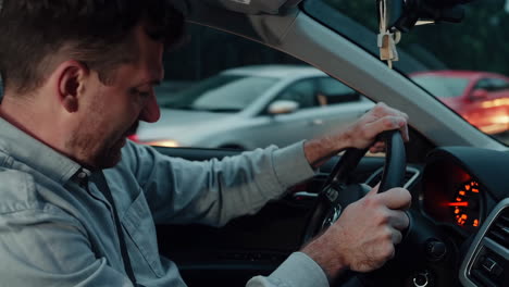 man driving in traffic experiencing road rage and frustration