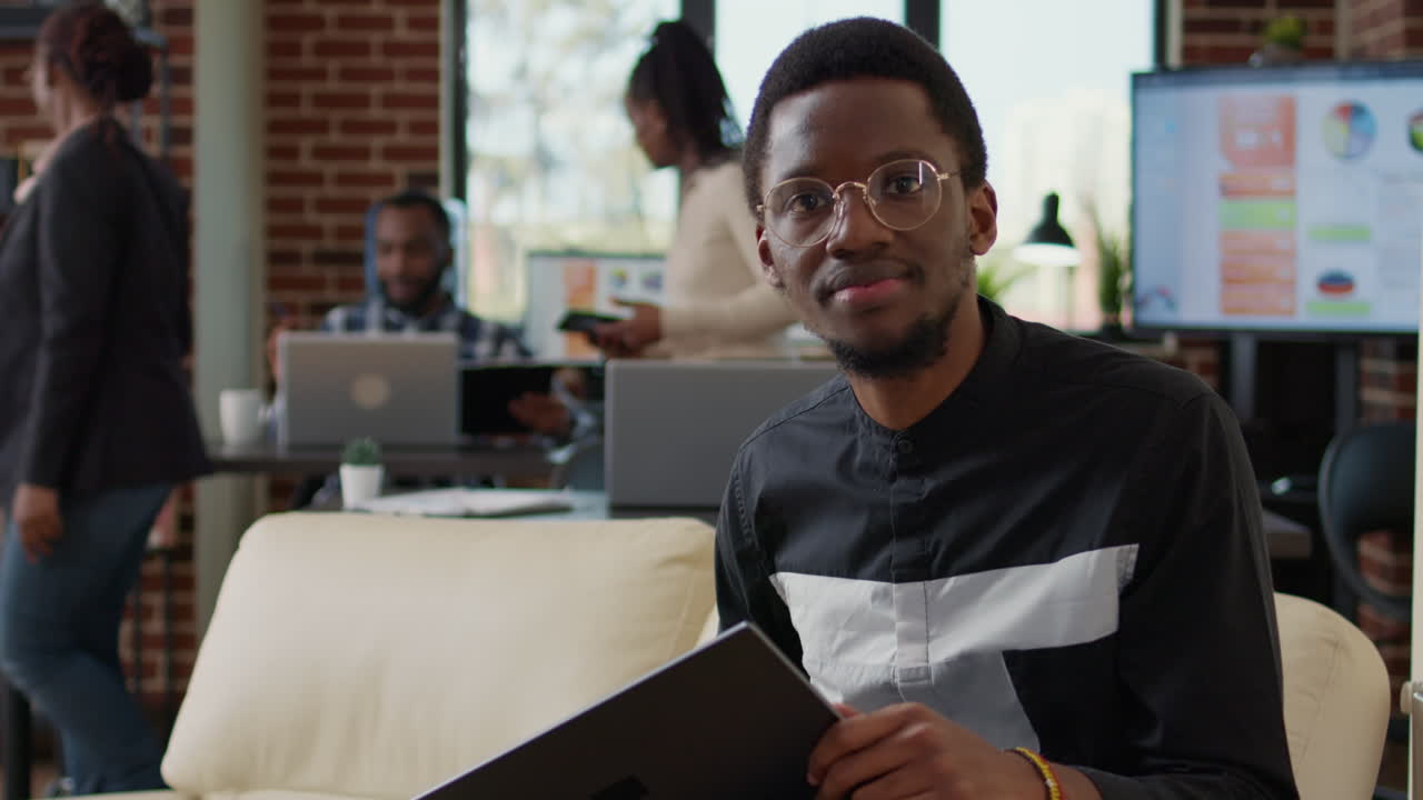 Portrait of male employee planning company meeting