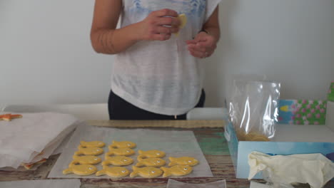 Footage-Of-a-Caucasian-woman-Making-Fish-Cookies