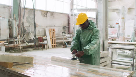 man polishing marble