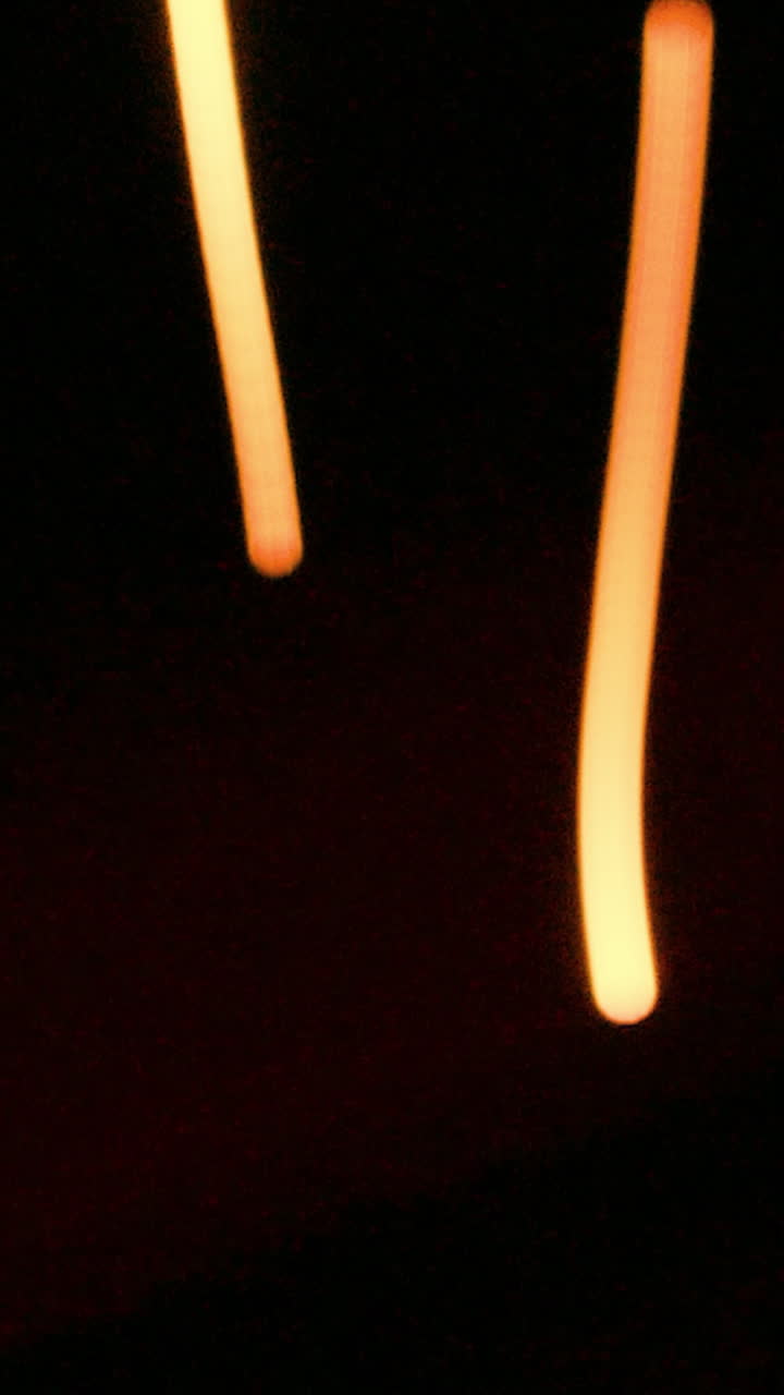 Abstract Glowing Light Trails on a Dark Background