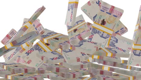 many wads of money falling on table. 200 ukrainian hryvnia banknotes. stacks of money.