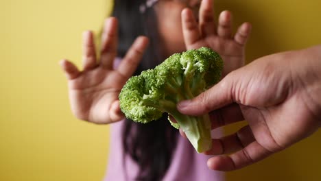 child refusing broccoli
