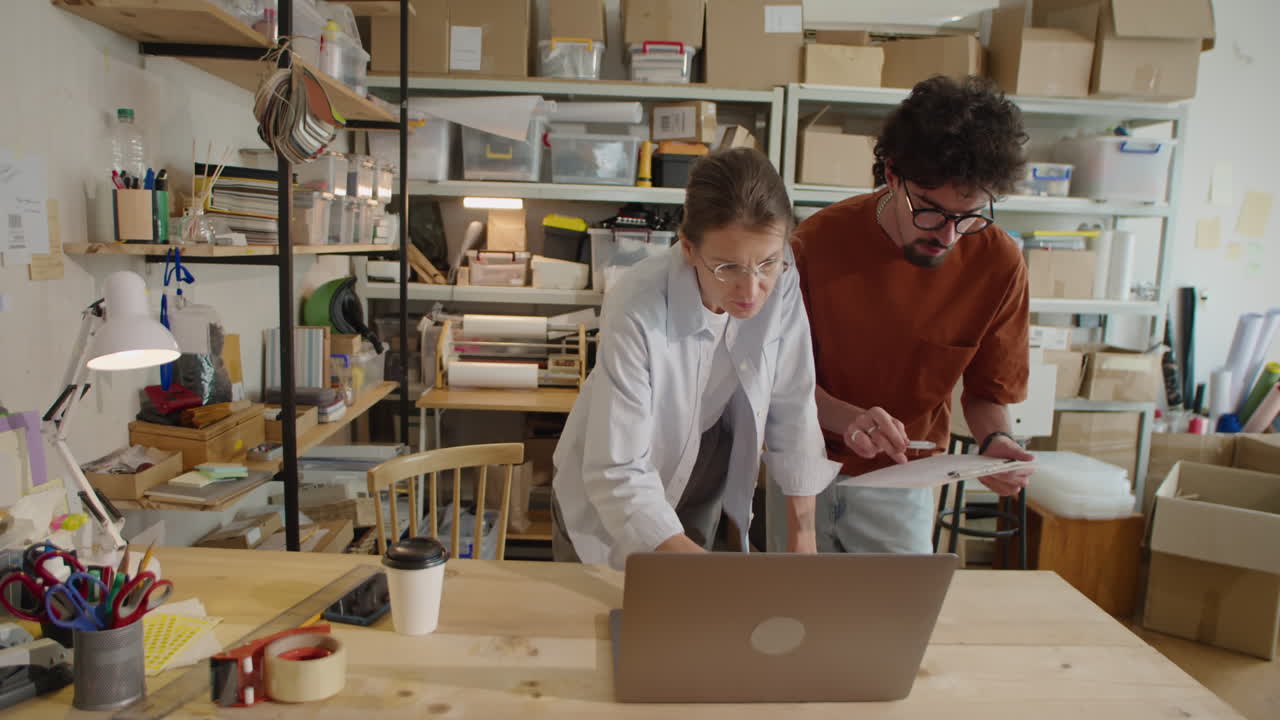 Colleagues Cooperating in Delivery Service Office