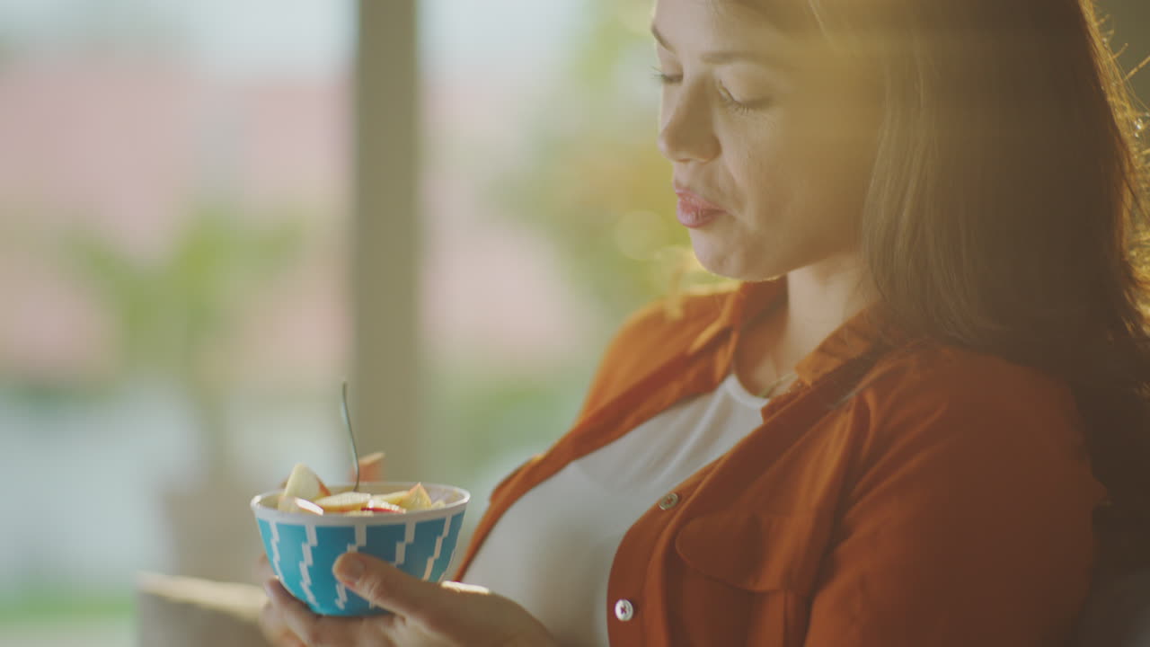 Pregnant woman enjoying a meal