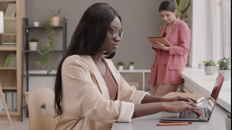 two women working in an office