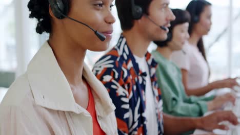 Call-centre-staff-working-in-a-modern-office