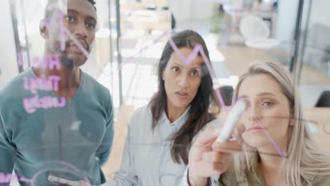 Busy-diverse-business-people-discussing-work-at-glass-wall-in-slow-motion