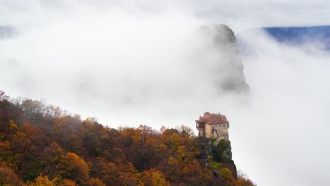 4K-Epic-Foggy-Landscape,-Beautiful-Meteora-Greece,-Monastery-on-a-mountain-above-the-clouds