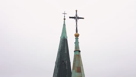 close-up of a church spire with a cross on top