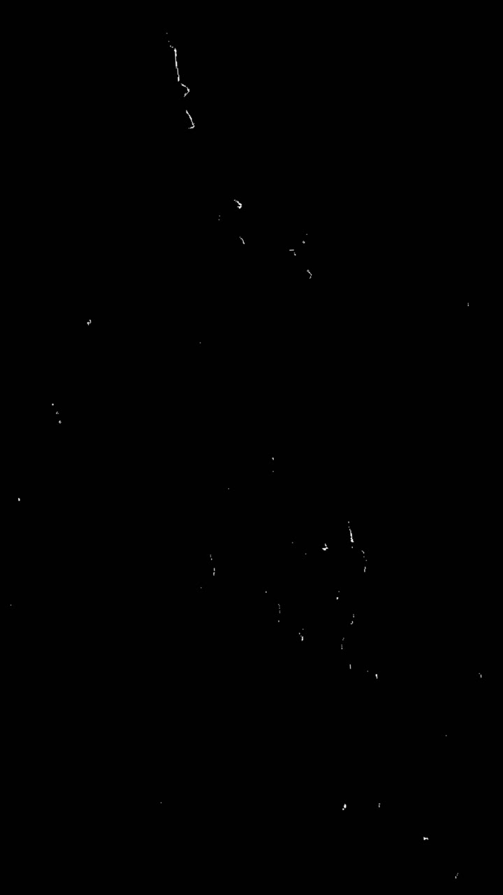 Moving White Dust Particles on Black Background