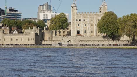 river thames and the white tower in medieval castle tower of london, united kingdom