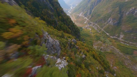 fpv drone dives down a steep mountain in theth, albania